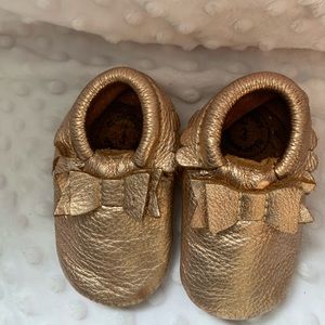 Rose gold moccasins